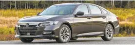  ?? HONDA/AP ?? Honda has agreed to license patents for hybrid vehicle technology, such as that used in the 2018 Honda Accord Hybrid, with Paice, a firm backed by the Abell Foundation.