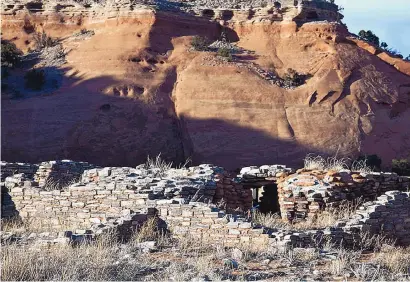  ??  ?? Casamero Pueblo, near Grants, is set against stunning red sandstone bluffs with owl eyes.