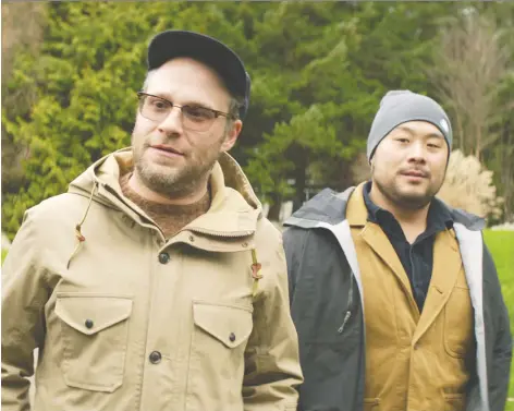  ?? NETFLIX ?? Seth Rogen and David Chang work earlier this year on the Vancouver set of Chang’s Netflix docuseries, Breakfast, Lunch and Dinner.