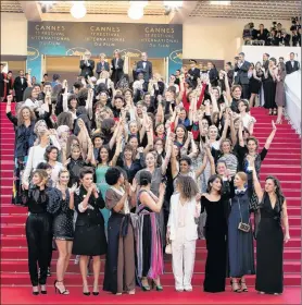  ?? AP PHOTO ?? In this May 12 file photo, 82 film industry profession­als stand on the steps of the Palais des Festivals to represent, what they describe as pervasive gender inequality in the film industry, at the Cannes Film Festival in Cannes, France.