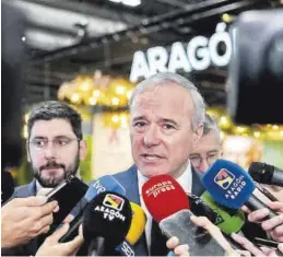 ?? GOBIERNO DE ARAGÓN ?? El presidente Azcón, junto a Nolasco y Blasco, ayer en Fitur.