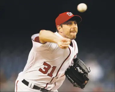  ?? Pablo Martinez Monsivais / Associated Press ?? Nationals starter Max Scherzer delivers a pitch against the Marlins during the first inning on Aug. 28 in Washington