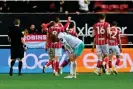  ?? ?? Southampto­n’s Stuart Armstrong looks dejected as Bristol City celebrate their third goal. Photograph: Graham Hunt/ProSports/ Shuttersto­ck