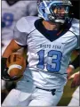  ?? MEDIANEWS GROUP FILE PHOTO ?? North Penn’s Dominic Taggart (13) looks for yardage during second-half action of a playoff contest against Council Rock South.