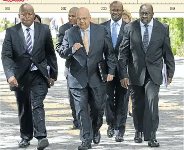  ?? Picture: BUSINESS DAY ?? PEOPLE TO RELY ON: Finance Minister Pravin Gordhan and his top officials in calmer days in 2013