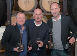  ?? Picture: A GORMAN ?? UPFRONT: Winners of the Absa Top 10 for a record 10 times – Abrie Beeslaar (Kanonkop) and Pierre Wah (Rijks) flank Pinotage Associatio­n chairman Beyers Truer.