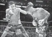  ?? Danny Moloshok Associated Press ?? LEO SANTA CRUZ, left, defeated Abner Mares by majority decision at Staples Center in August 2015.