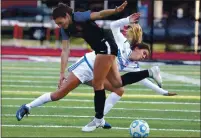  ?? SANTA CRUZ SENTINEL FILE ?? Santa Cruz High sophomore Natalie Wenger, left, collides with Christian Brothers High School player Grace Clote as they compete for a loose ball near midfield during the NorCal Division V playoffs on March 3, 2020, in Santa Cruz. Christian Brothers won the match 1-0.