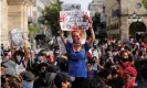  ??  ?? A protester holds up a sign in Guadalajar­a, Jalisco, during a rally on Saturday. Photograph: Francisco Guasco/EPA