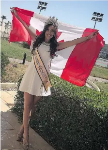  ??  ?? Amber Bernachi proudly waves the flag as Miss Eco Internatio­nal 2017.