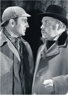  ??  ?? Basil Rathbone and Nigel Bruce as Holmes and Watson