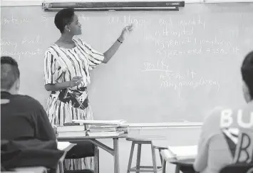  ?? ERIC DRAPER AP ?? State legislator­s have hamstrung teachers by banning books and discussion­s of relevant social issues.