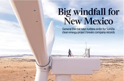  ?? RICH CROWDER VIA THE ASSOCIATED PRESS ?? A worker atop a wind turbine at the Borderland Wind Project in Western New Mexico. GE Vernova is set to build 674 turbines that will be used for the SunZia Wind Project in Central New Mexico, which is expected to be the largest wind farm in the Western Hemisphere when it comes online in 2026.