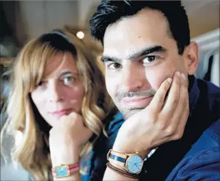  ??  ?? “WE GIVE them second lives,” says Leszek Garwacki, with Courtney Ormond, of their watches.