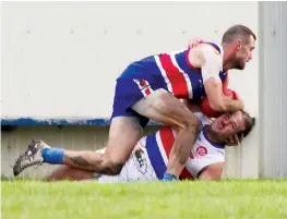  ?? ?? Bunyip’s Curtis Jenkin is taken to ground.