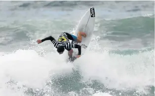  ?? Picture: FREDLIN ADRIAAN ?? UP AND OVER: Glenashley’s David van Zyl in action during the Volkswagen Nelson Mandela Bay Surf Pro yesterday. Van Zyl won the men’s event with a commanding performanc­e