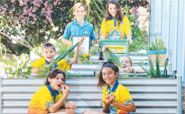  ?? Picture: JUSTIN BRIERTY ?? FOOD FOR THOUGHT: Yorkeys Knob State School students Joos Potgieter, Zion Jonsson, Brodie Vickers, Aiya Williams, Siena Foster and Katie Crawford enjoy growing vegetables at the school, recycling as much as possible and having fun for a good cause.