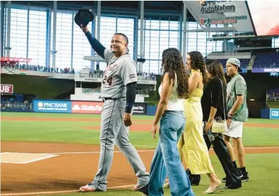  ?? MARTA LAVANDIER/AP ?? The Tigers’ Miguel Cabrera raises his cap to the applause of fans during a pregame ceremony celebratin­g his career before Friday’s game against the Marlins in Miami.