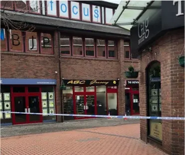  ?? ?? Parts of Wokingham town centre were sealed off so police could investigat­e a stabbing last month