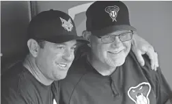  ?? AP ?? Former Twins manager and current Diamondbac­ks bench coach Ron Gardenhire poses with former Twins player Nick Punto before Friday’s game in Minneapoli­s.