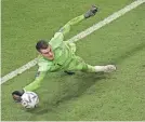  ?? LUCA BRUNO/AP ?? Croatia’s goalkeeper Dominik Livakovic saves a penalty kick by Japan’s Kaoru Mitoma.