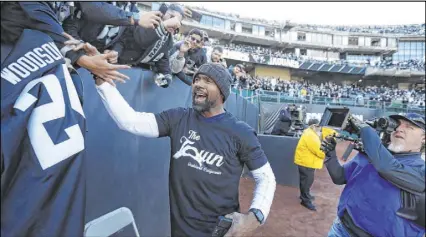  ?? D. Ross Cameron The Associated Press ?? The Raiders’ Charles Woodson greets fans before a 2019 game against the Jaguars in Oakland.