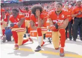  ?? MERCURY NEWS ?? From left, San Francisco 49ers’ Eli Harold, Colin Kaepernick and Eric Reid kneel during the national anthem before their game against the Dallas Cowboys on Oct. 2, 2016, at Levi’s Stadium in Santa Clara, Calif.