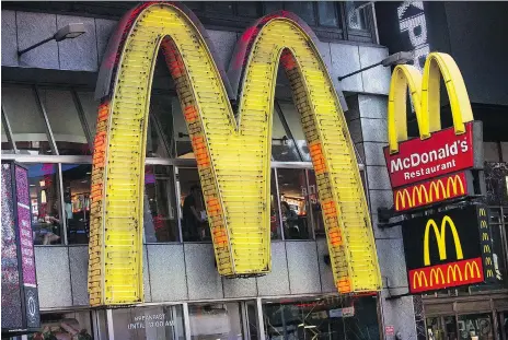  ?? ANDREW BURTON/GETTY IMAGES ?? Along with higher costs that have forced eateries to raise prices, restaurant­s like Mcdonald’s are grappling with a shift in consumer tastes. Factors driving the change include the rise of pre-made meals, online grocery delivery, and a focus on healthy eating.