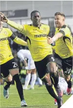  ??  ?? Burton’s Marvin Sordell celebrates scoring the Brewers’ first goal.