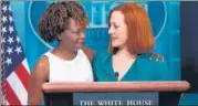  ?? AFP ?? Jen Psaki (right) is hugged by Karine Jean-Pierre during a press briefing at the White House in Washington, DC, on Thursday.