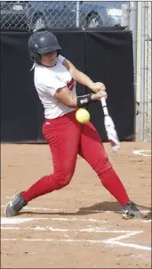  ?? PHOTO ?? ABOVE LEFT: Imperial Valley College’s Skyler Tyson fouls off a pitch during the Arabs’ home game against Palomar College on Wednesday afternoon. KARINA LOPEZ PHOTO ABOVE RIGHT: Imperial Valley College’s Hazmin Guardado makes a throw to first base....