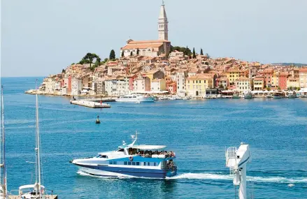  ?? RICK STEVES ?? Croatia’s romantic Rovinj has Venetian vibes, but a breezy charm that’s all its own.