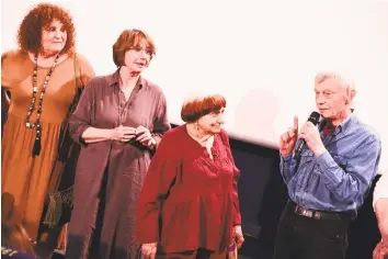  ?? Anthony Ghnassia / Getty Images ?? Valérie Mairesse, Thérèse Liotard, Agnes Varda and Charlie Van Damme at the premiere of the newly restored 1977 film “One Sings, The Other Doesn't” in Paris last July. Below, a still from the film.