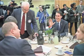  ?? MICHAEL SEARS / MILWAUKEE JOURNAL SENTINEL ?? Gov. Scott Walker, who spoke at San Camillo Retirement Community in Wauwatosa Wednesday, said the Trump administra­tion is interested in restrictio­ns on unions.