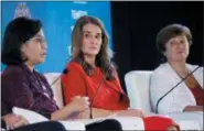  ?? AP PHOTO/FIRDIA LISNAWATI, FILE ?? Co-Chair of the Bill and Melinda Gates Foundation, Melinda Gates, center, sits on a panel with Indonesia’s Finance Minister Sri Mulyani Indrawati, left, and Chief Executive Officer of the World Bank Kristalina Georgieva, right, during a seminar Oct. 11 ahead of the annual meetings of the IMF and World Bank in Bali, Indonesia.