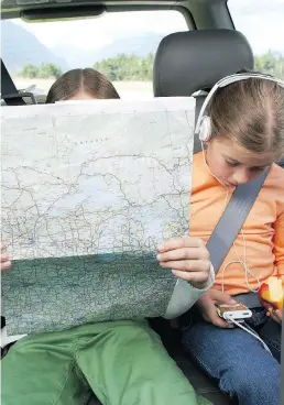  ?? ISTOCK ?? Road trips are a great opportunit­y to have a family talk and connect with one another for a few hours — but only if you can keep the smartphone­s away.