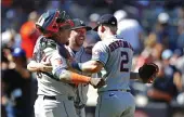  ?? NOAH K. MURRAY — THE ASSOCIATED PRESS ?? Houston Astros relief pitcher Ryan Pressly (55) celebrates with Martin Maldonado and Alex Bregman (2) after a combined no-hitter against the New York Yankees on Saturday in New York. The Astros won 3-0.