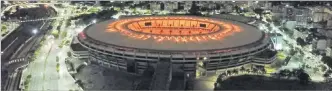  ?? Picture: REUTERS ?? The Maracana stadium is seen illuminate­d with golden lights in honour of Pele, in
Rio de Janeiro, Brazil.