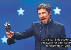  ??  ?? Christian Bale accepts the award for Best Actor for his work in ‘Vice’.