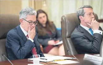  ?? THE ASSOCIATED PRESS ?? Before he took the helm, Fed Chairman Jerome Powell, left, said last year that banks have made progress and “we’re getting to the point where qualitativ­e supervisio­n of risk management can no longer be part of the stress test.”