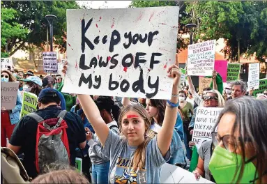  ?? ?? Pro-choice: women in San Francisco, Los Angeles, right, and Washington DC, below, protest at the Supreme Court’s apparent decision to overturn the 1973 Roe v Wade ruling