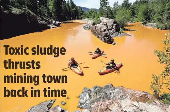  ??  ?? People kayak in the Animas River near Durango, Colo., on Thursday in water tainted from a gold mine spill. The EPA dispatched a cleanup team.
JERRY MCBRIDE, AP