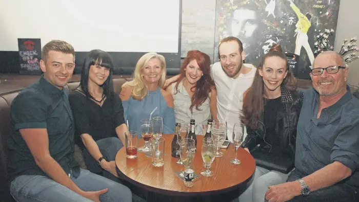  ??  ?? New Yorker Lena, centre, with her English family and friends in Mist Bar. 152293i