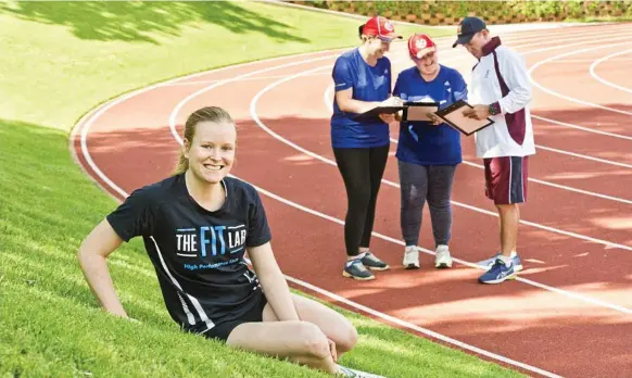  ?? Photo: Nev Madsen ?? UP AND RUNNING: Belinda Slatter (front) was the first female to sign up for Darling Downs Athletics at the club launch on Sunday at The Glennie School. Also pictured at back (from left) are DDA secretary-treasurer Natalie Wright, president Janine Ritter and Toowoomba coach Tom Bradbury.