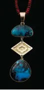  ??  ?? Necklace with Bisbee turquoise and spiny oyster, 22k gold bezel, 18k gold emblem, 18k gold bale, sterling silver back
