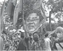  ?? FAVILA/AP
AARON ?? Demonstrat­ors in Manila, Philippine­s, protest the legitimacy of the results of the presidenti­al elections.