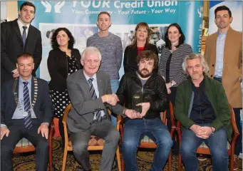  ??  ?? Noel McElligott (Listowel)Overall Winner of the Donal Walsh Live Life Foundation Film Award Adult category for his film on the theme ‘Take my Hand’. Presenting Noel with his prize is Finbar Walsh.