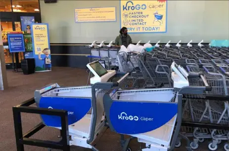  ??  ?? Kroger is testing out 20 smart carts by artificial intelligen­ce company Caper.
Caper