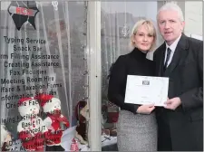  ??  ?? Jackie Taaffe of The Resource Centre accepts the award from Hubert Murphy.