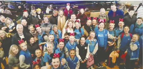  ??  ?? Members of Steppin Out and their families – the young performers went to Disneyland Paris to perform in a special Easter show